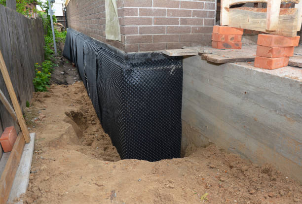 Happy homeowners after waterproofing job in Three Rivers